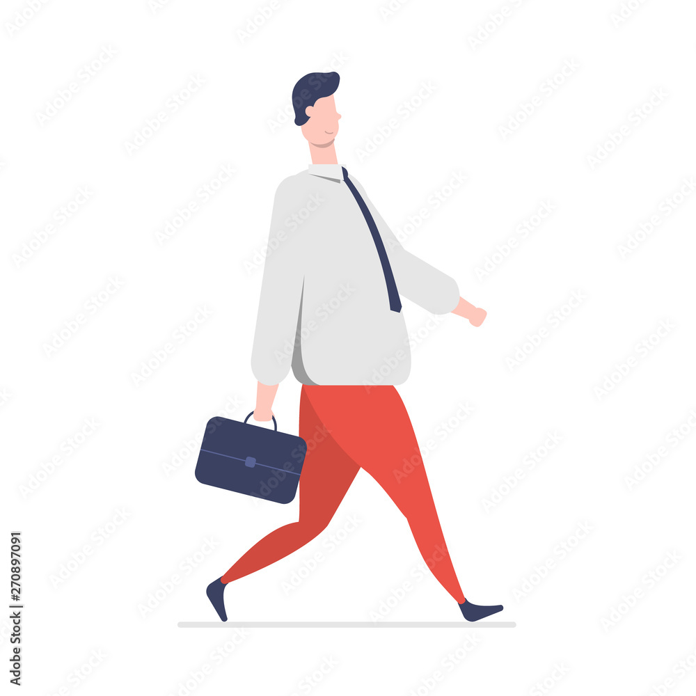 The successful businessman with a briefcase walks