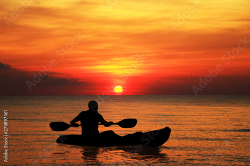 Wallpaper Mural silhouette Kayaker in wild water on sunrise Torontodigital.ca