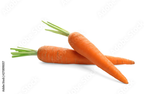 Fresh ripe carrots on white background. Wholesome vegetable