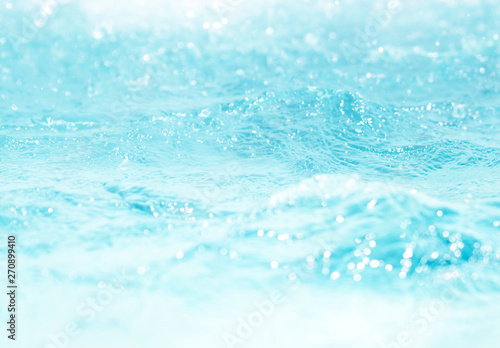 Blurred water  glittering bokeh abstract  background nature