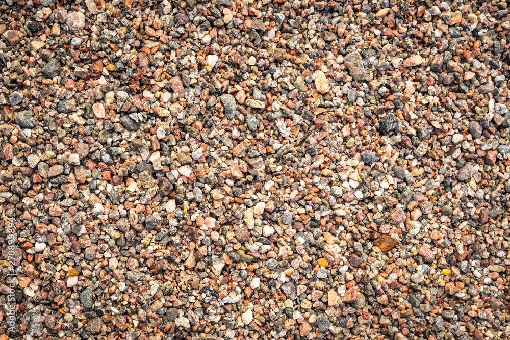 Sea pebble texture. Small multicolored pebble-stones. Close up beach stones surface. Sea pebble texture. Small multicolored pebble-stones. Close up beach stones surface.