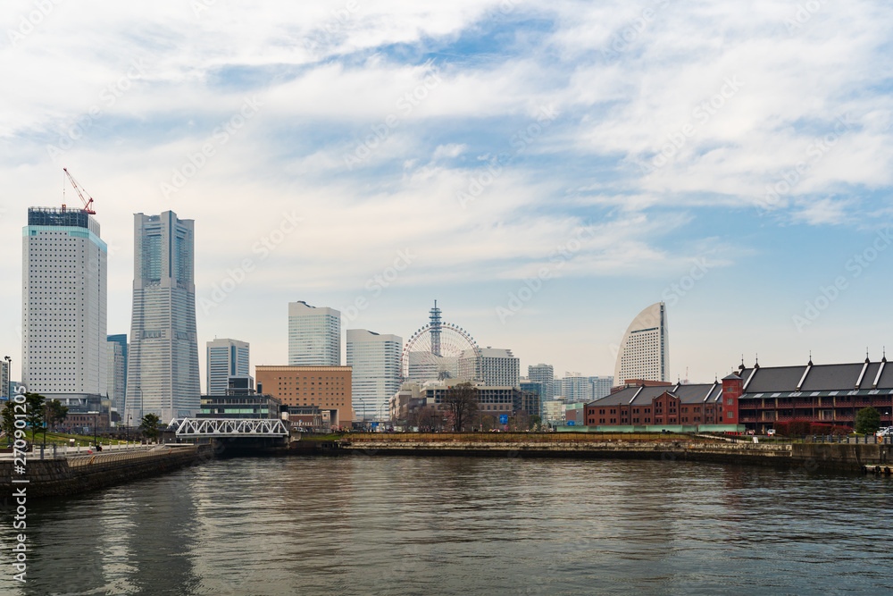 skyline of Minatomirai, view from the bay in Yokohama, Japan