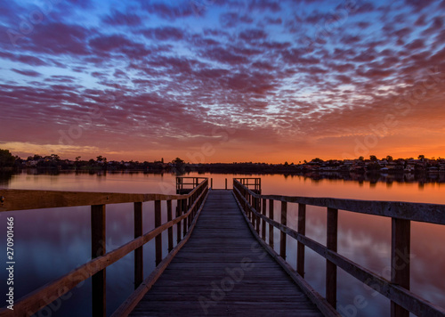 Looking down the Jetty  with a colorful Sky at Sunset in Perth Australia