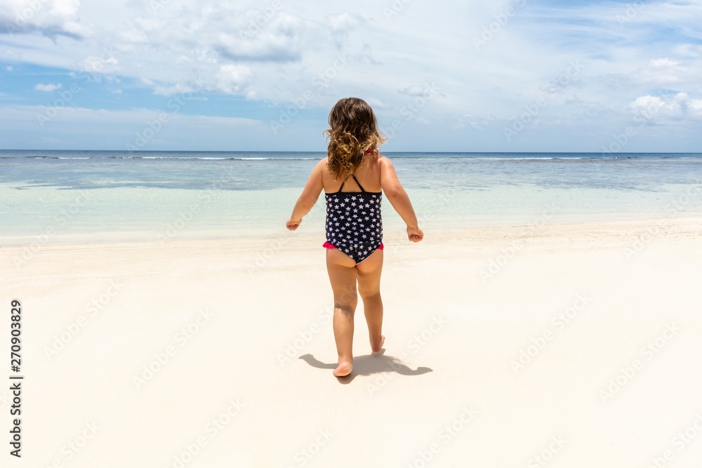 Little Girl Walking On Anse Baleine Beach