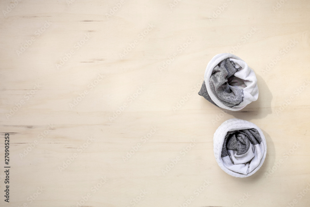 used socks on wood background used socks on wood background