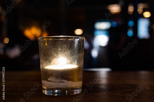 Candle in an irish pub