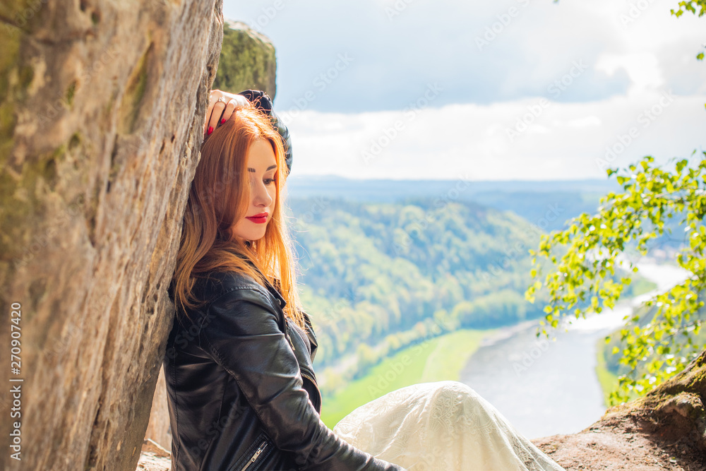 Tourism concept, pretty romantic woman look at beautiful view in mountains , Vacation in Saxon Switzerland 