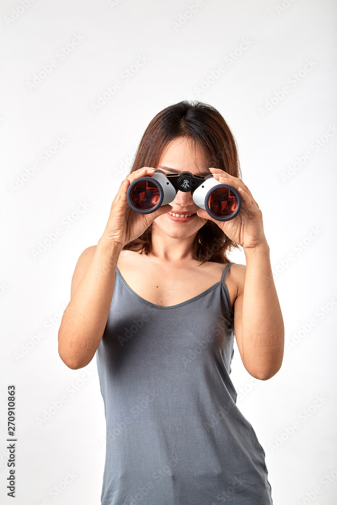 Young Asian woman with binoculars