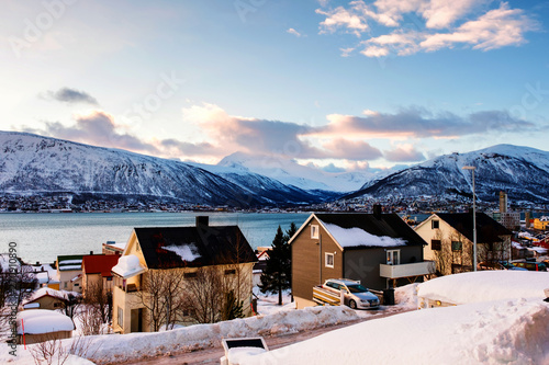 Sunrise of famous north town Tromso, Norway. View of the fjord