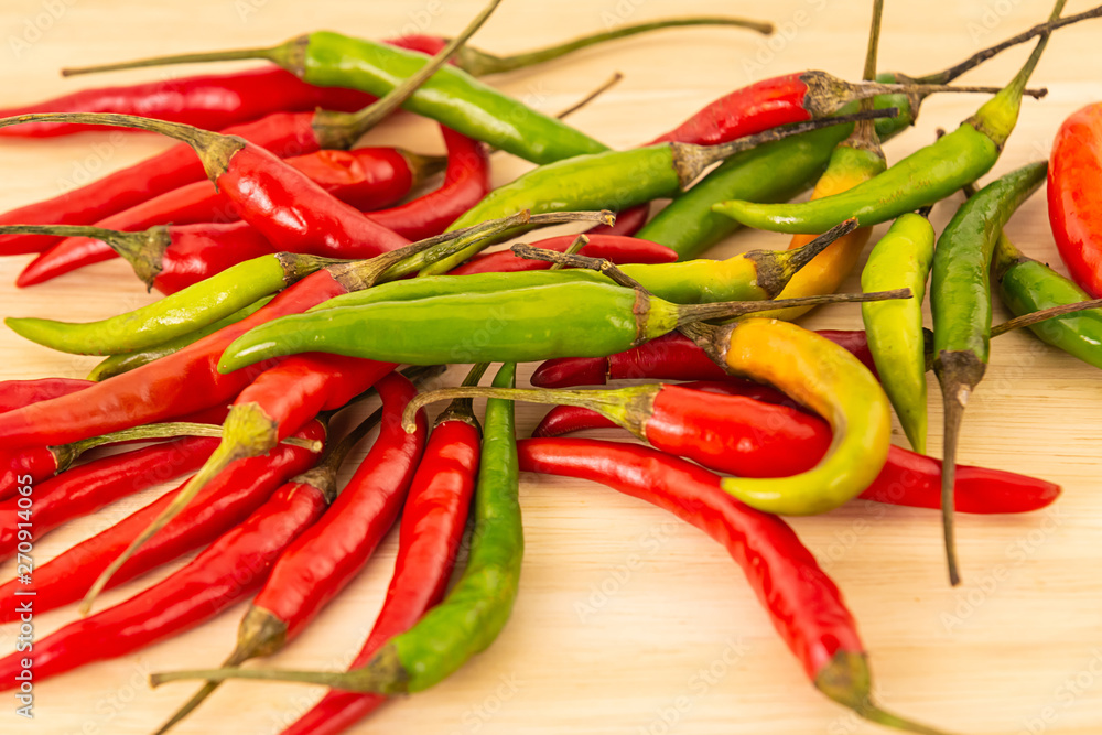 mix hot chili peppers red green vegetables set background