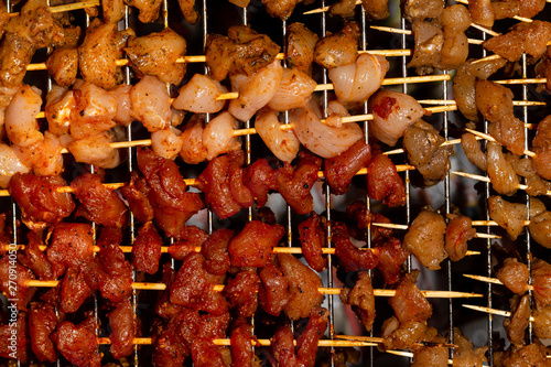 background culinary many pieces of meat chicken pork appetizing skewer flavored colorful photo