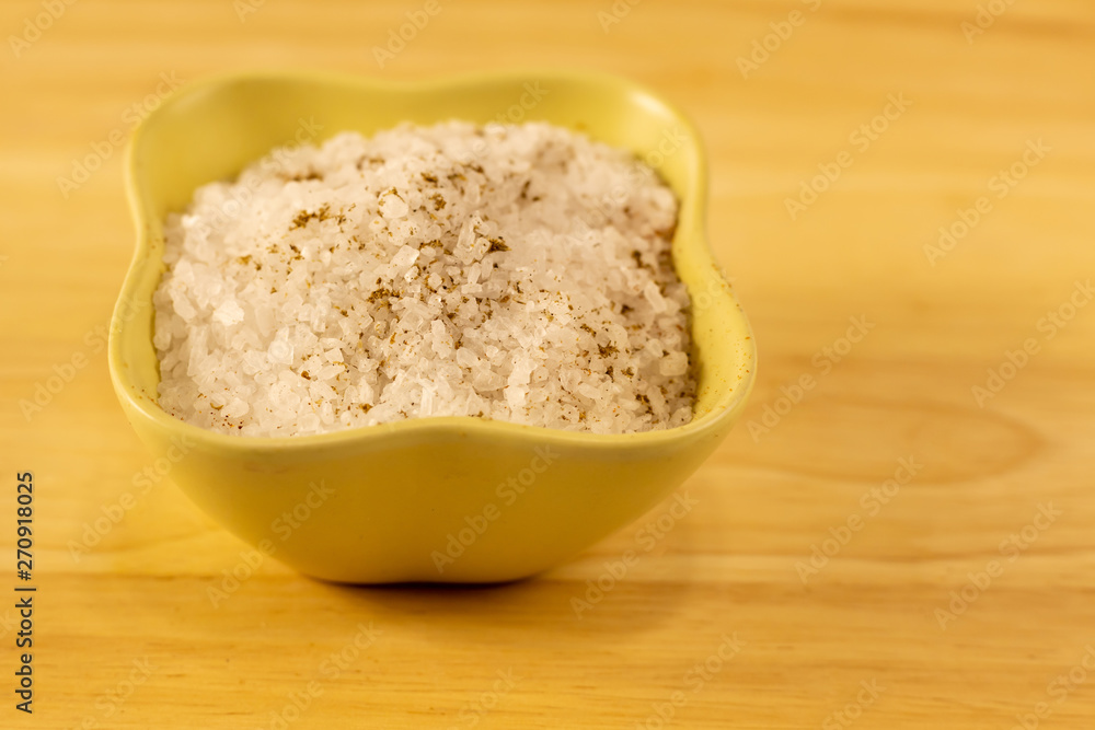 ceramic bowl full salt large white crystal many slice on a wooden background ceramic bowl full salt large white crystal many slice on a wooden background