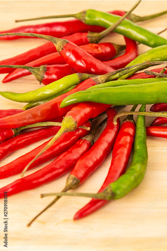 green red pepper spicy base of salsa sauce seasoned close-up vegetable background on a wooden backdrop