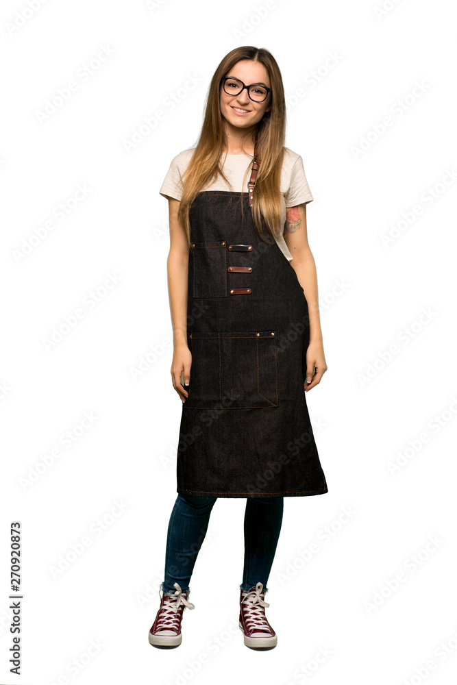 Full body Young woman with apron with glasses and happy on isolated background Full body Young woman with apron with glasses and happy on isolated background