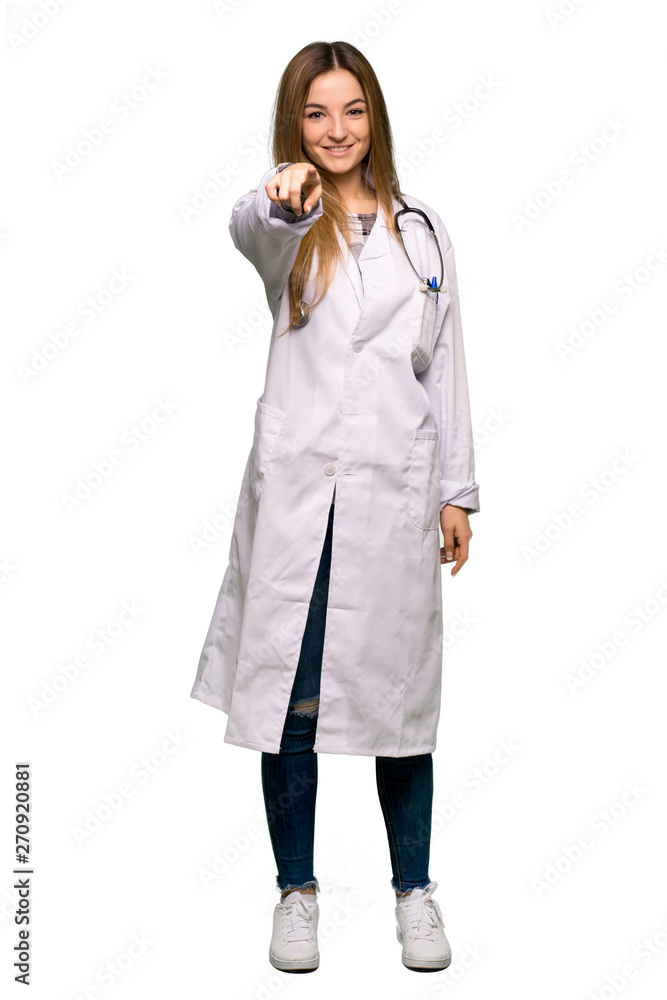 Full body Young doctor woman points finger at you with a confident expression on isolated background Full body Young doctor woman points finger at you with a confident expression on isolated background