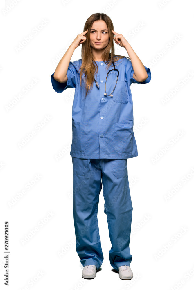 Full body Young nurse having doubts and thinking on isolated background Full body Young nurse having doubts and thinking on isolated background