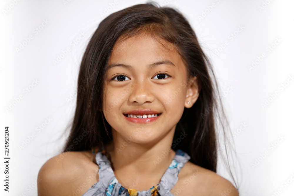 Pretty asian girl in butterflies dress smiles happy Pretty asian girl in butterflies dress smiles happy
