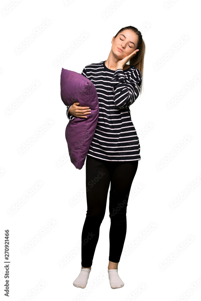 Full body Pretty woman in pajamas making sleep gesture in dorable expression on isolated background Full body Pretty woman in pajamas making sleep gesture in dorable expression on isolated background