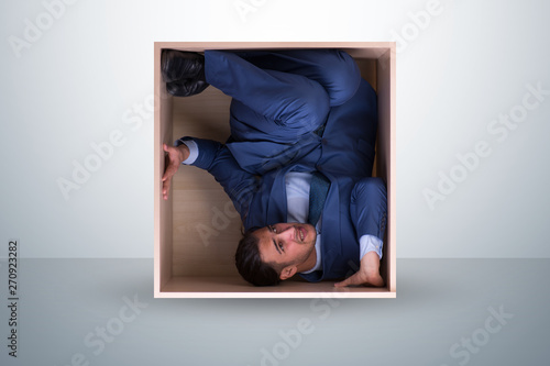 Employee working in tight space photo