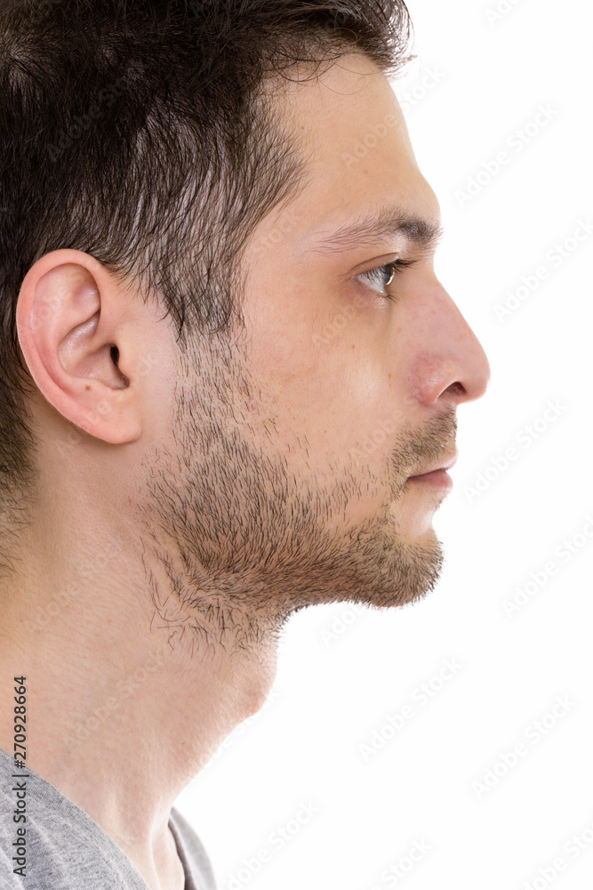 Close up profile view of face of young man Close up profile view of face of young man