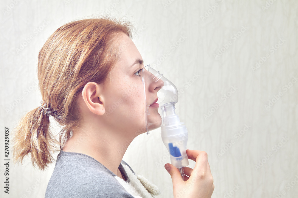 Breathing with nebulizer chamber during inhalation. Breathing with nebulizer chamber during inhalation.