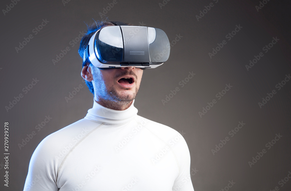 Man wearing virtual reality goggles Man wearing virtual reality goggles