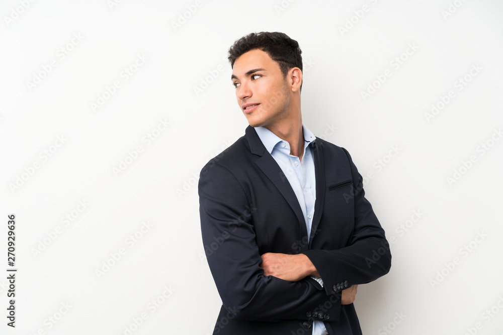 Handsome man over isolated white wall laughing Handsome man over isolated white wall laughing