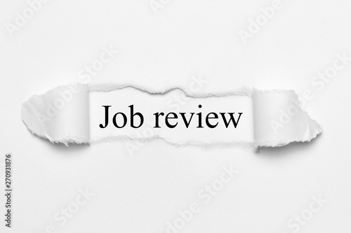 Job review on white torn paper