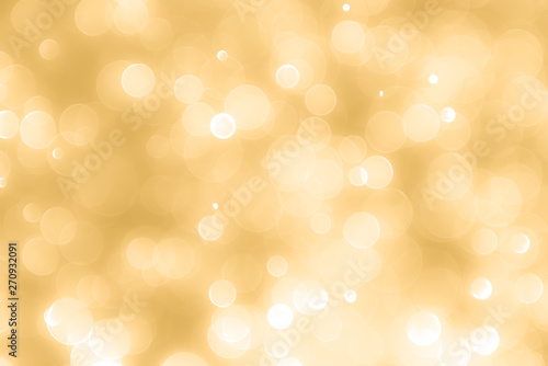 Gold background with light bokeh. Abstrat background