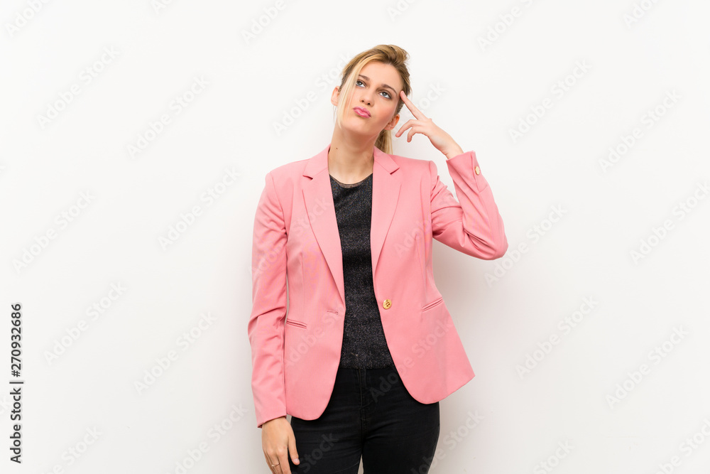 Young blonde woman with pink suit with problems making suicide gesture Young blonde woman with pink suit with problems making suicide gesture