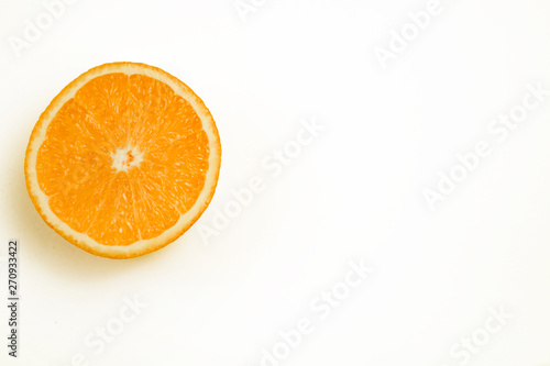 half an orange on white background  Isolated photo.