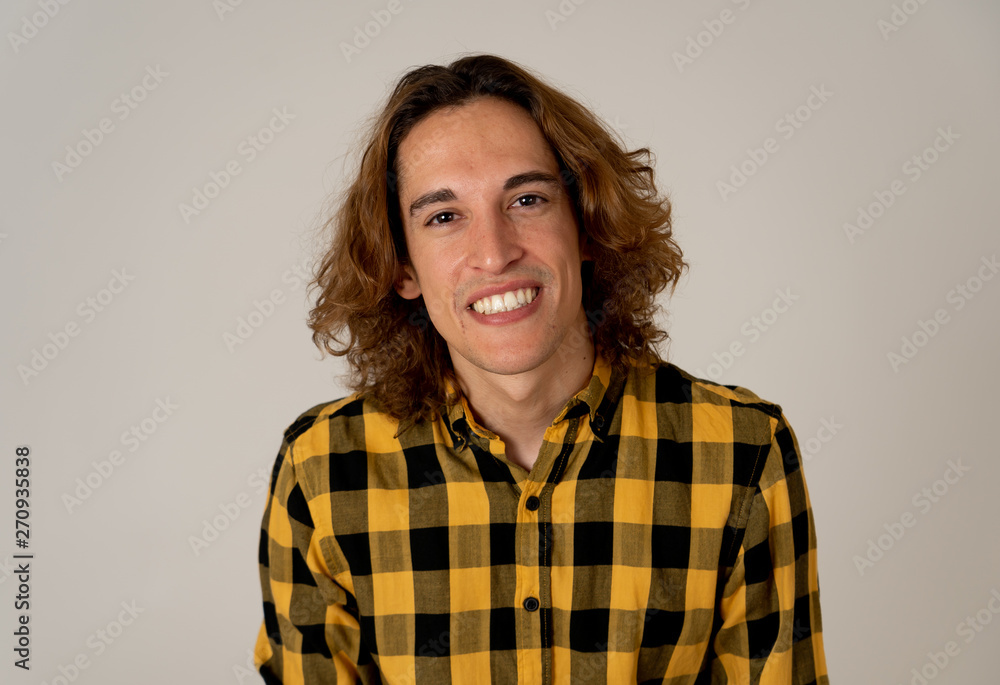 Portrait of young teenager with long hair posing happy for the camera. Beauty concept and lifestyle Portrait of young teenager with long hair posing happy for the camera. Beauty concept and lifestyle