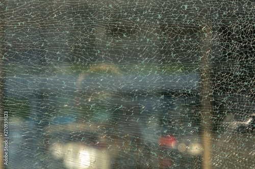 Broken glass in small cobweb across the frame