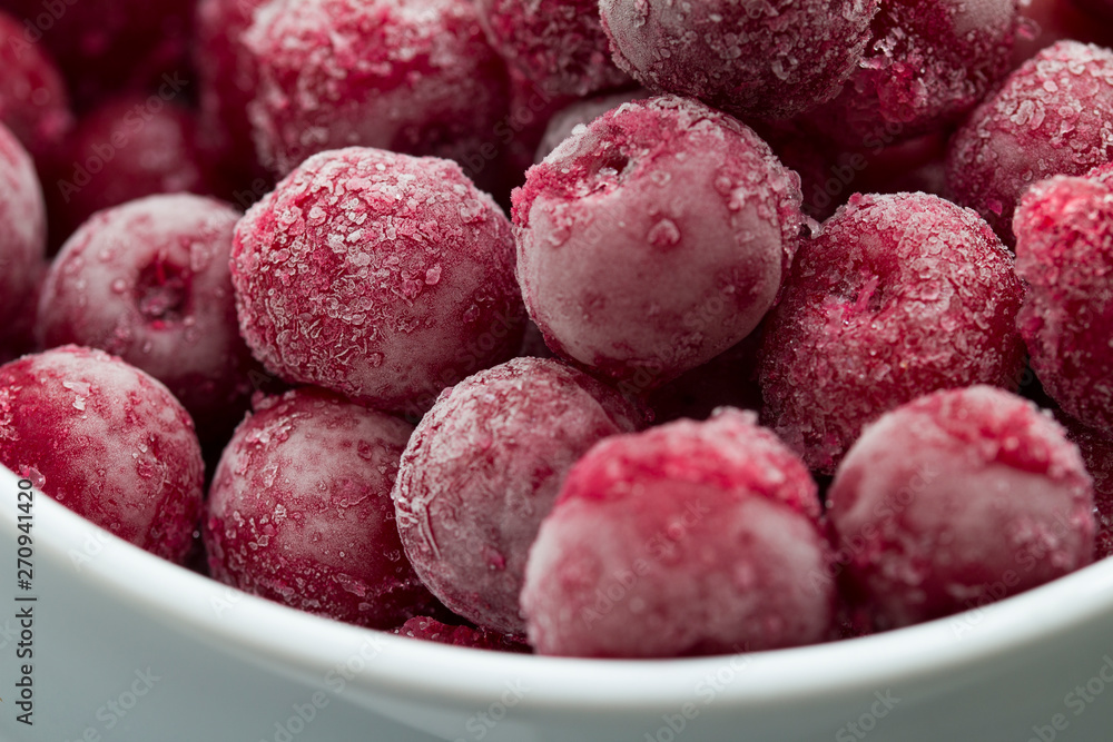 Group Of Frozen Cherries on a dark background Close Up. Group Of Frozen Cherries on a dark background Close Up.