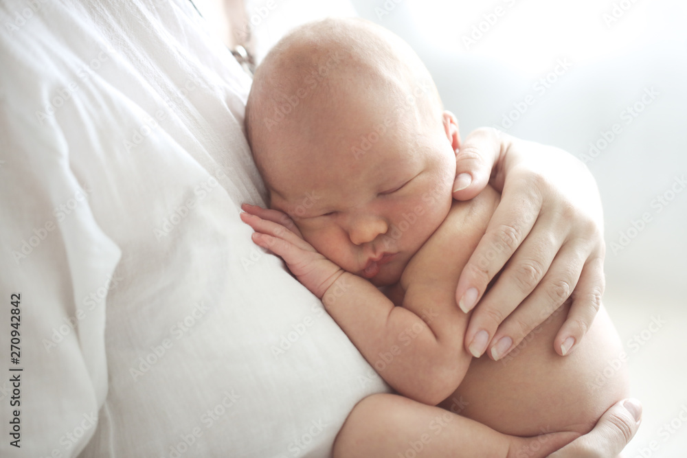 Mom and baby. Light photo in casual style Mom and baby. Light photo in casual style