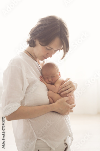 Mom and baby. Light photo in casual style