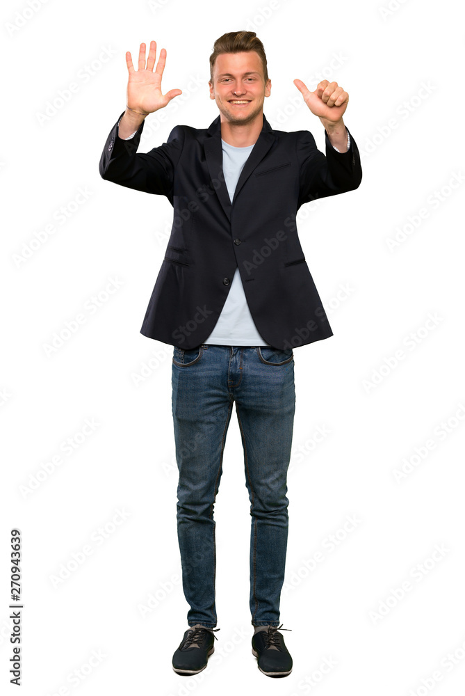 Blonde handsome man counting six with fingers Blonde handsome man counting six with fingers