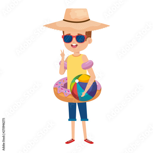 cute little boy with donut float and beach balloon