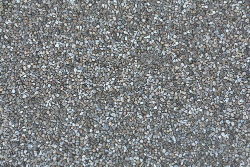 Many small stones on the beach gray .Texture.Background.