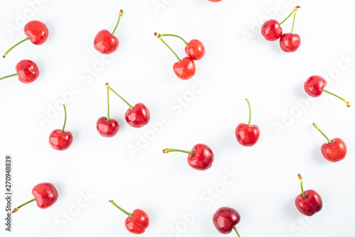 Fresh red cherries on white background