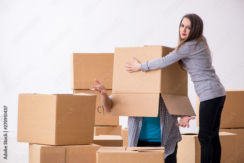Young pair moving to new flat Young pair moving to new flat