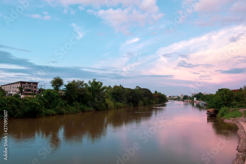 River view in urban city with beautiful evening sky.