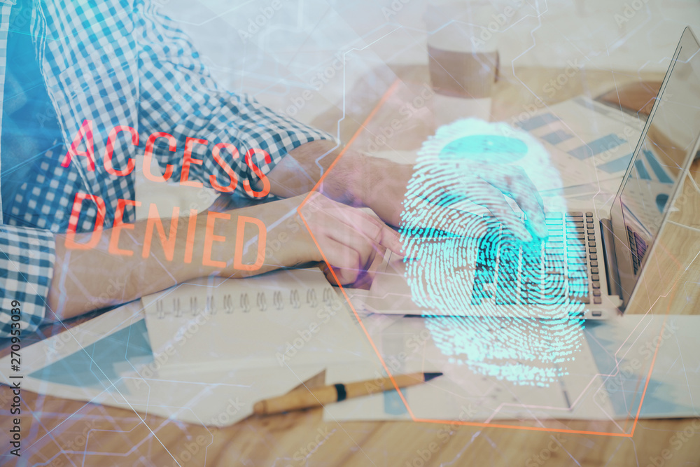 Fingerprint hologram with businessman working on computer on background. Security concept. Double exposure. Fingerprint hologram with businessman working on computer on background. Security concept. Double exposure.