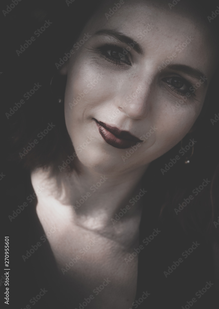 Fototapeta premium Attractive sincere woman with a quiet smile