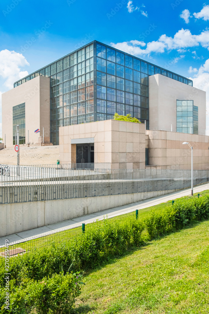 Building of the national and university library in Zagreb, Croatia, modern architecture, glass facade, and new public park. 