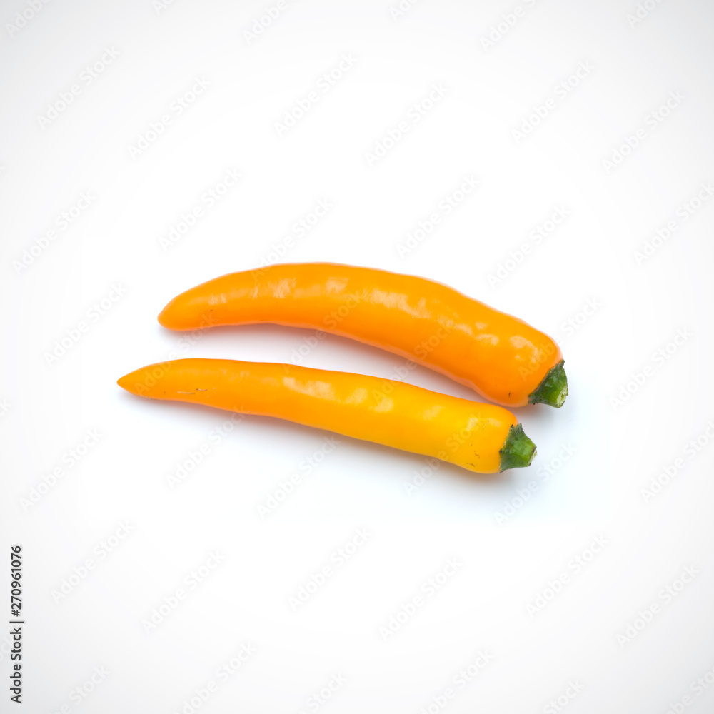 Yellow hot chili pepper isolated on the white background.