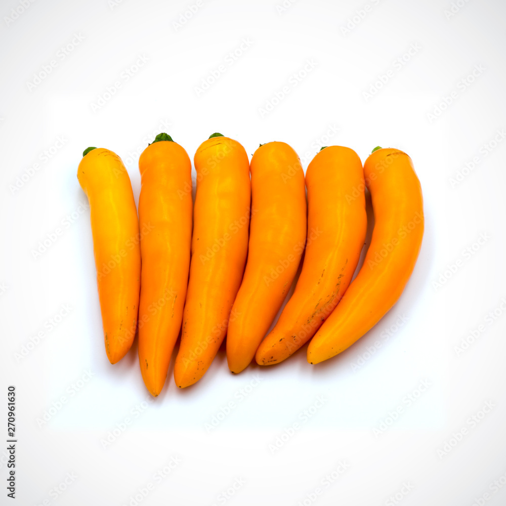 Yellow hot chili pepper isolated on the white background. Yellow hot chili pepper isolated on the white background.