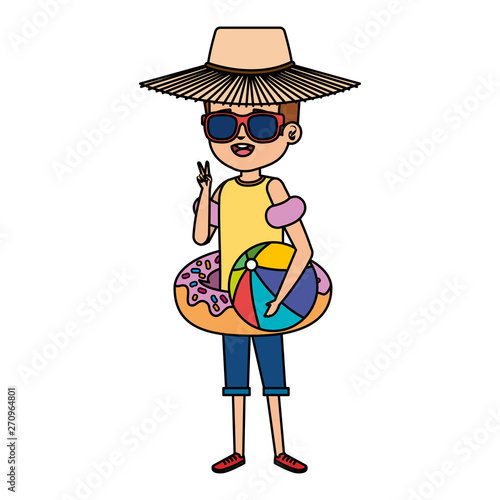 cute little boy with donut float and beach balloon