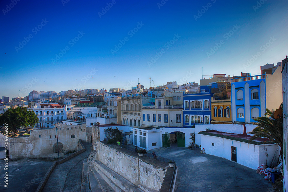 Fototapeta premium Moroccan mosque with the banner of Morocco. Islamic mosque for prayer. Port of Tangier