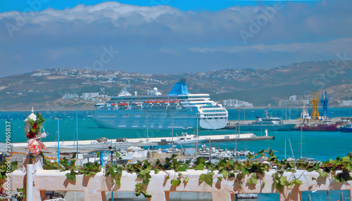 Moroccan mosque with the banner of Morocco. Islamic mosque for prayer. Port of Tangier